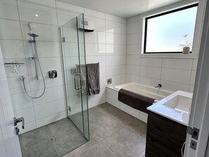 Shower, hair dryer, towels, soap