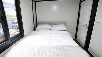 2 quartos, berço de viagem, Wi-Fi de cortesia, roupa de cama
