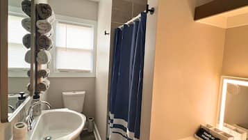 Shower, hair dryer, towels, soap