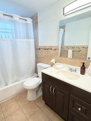 Hair dryer, towels, soap, toilet paper