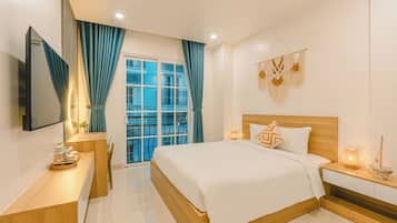 Quarto casal luxo, vista para o pátio | Wi-Fi de cortesia