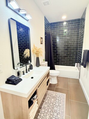 Hair dryer, towels, soap, toilet paper