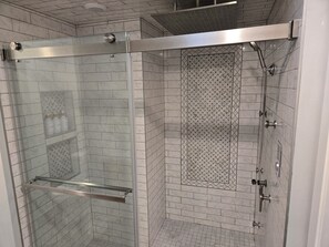 Shower, towels, soap, toilet paper