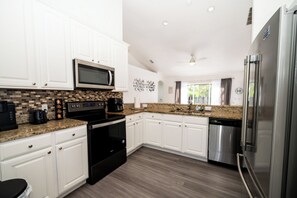 Fridge, microwave, oven, stovetop - Family-Friendly 4BR with Pool, Disney Area Getaway! (Davenport)