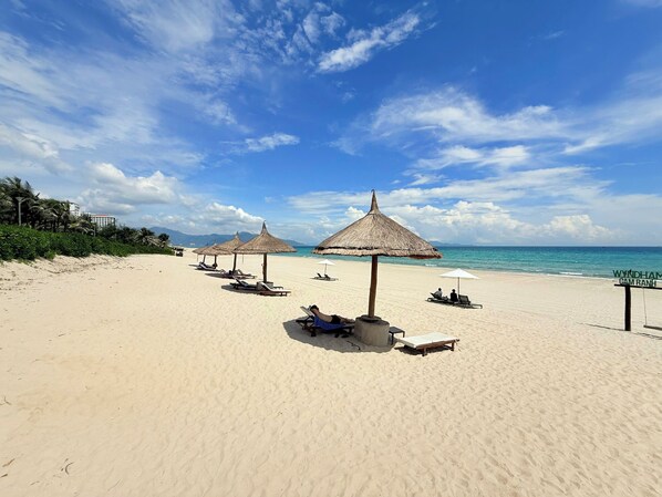 On the beach, white sand, free beach shuttle, sun-loungers