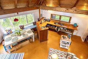 Fridge, oven, stovetop, dining tables