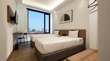 Superior Twin Room | Desk, blackout drapes, iron/ironing board, free WiFi