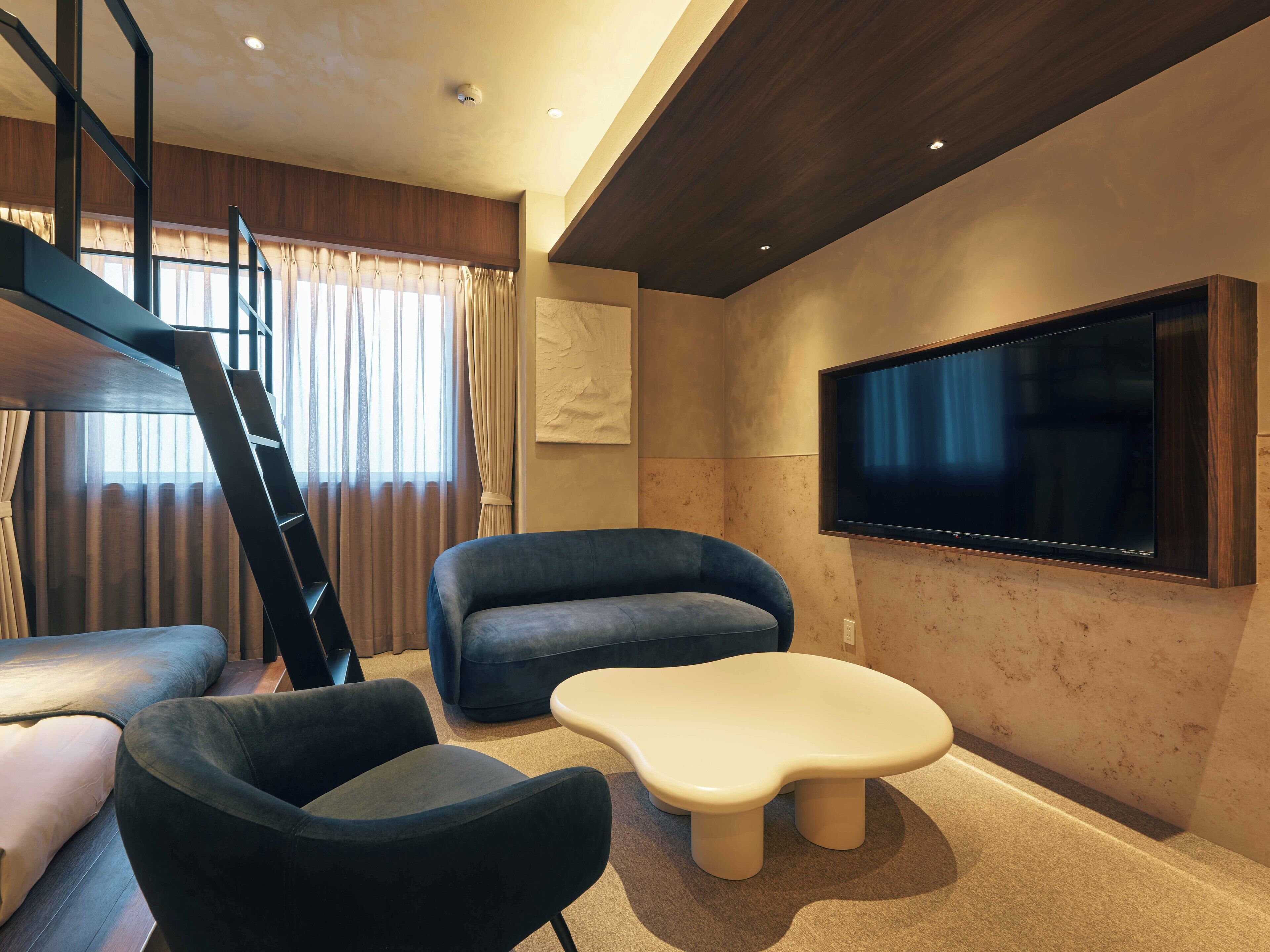 Deluxe studio | Woonruimte | Televisie