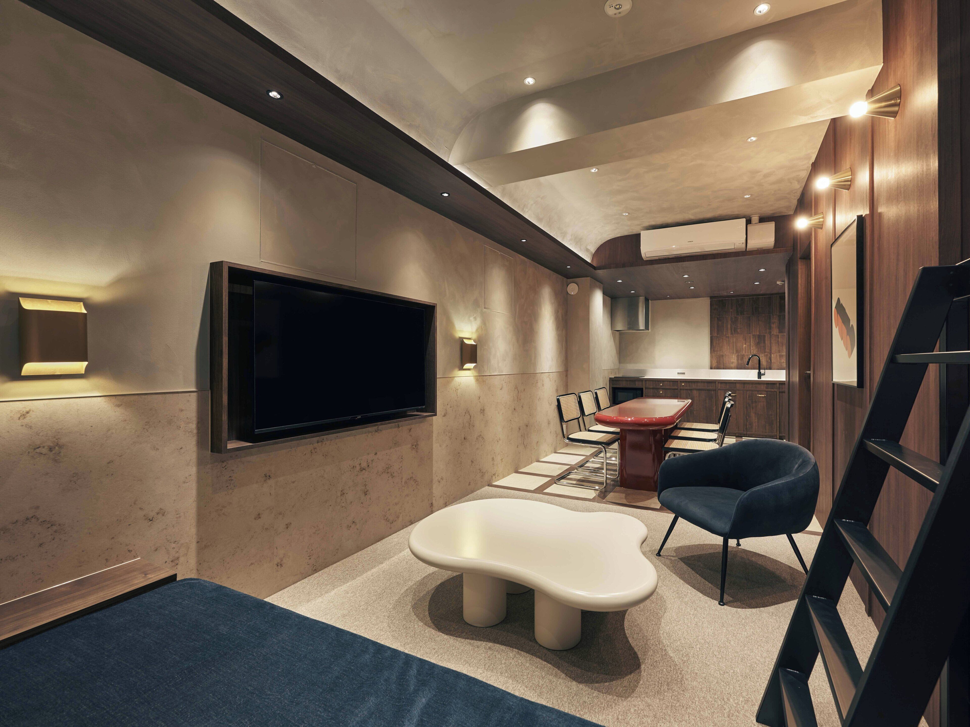 Superior Studio Suite | Living area | TV