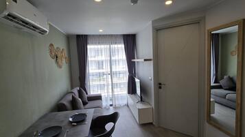 Apartment, Balcony | In-room safe, blackout curtains, iron/ironing board, free WiFi