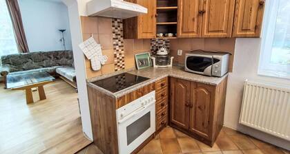 Nice apartment in villa for 2 guests with WIFI, pool and TV