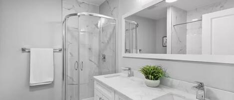 Shower, towels, soap, toilet paper
