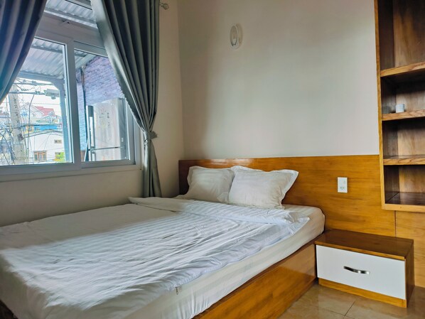 Blackout drapes, iron/ironing board, free WiFi