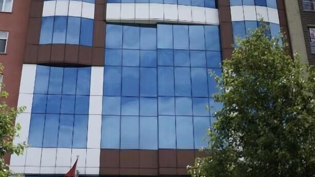 A modern hotel building with a prominent 'WEEN HOTEL' sign at the top. - WEEN OTEL (Trabzon)