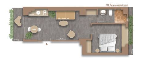 A 201 Deluxe Apartment layout with a balcony, kitchen, double bed, sofa, TV, vanity, and toilet.