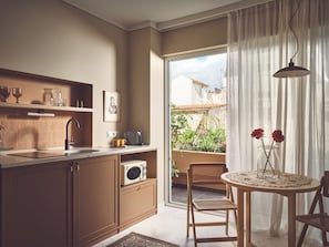 Appartamento Superior | Cucina privata | Frigorifero, microonde, piano cottura, macchina per caffè espresso