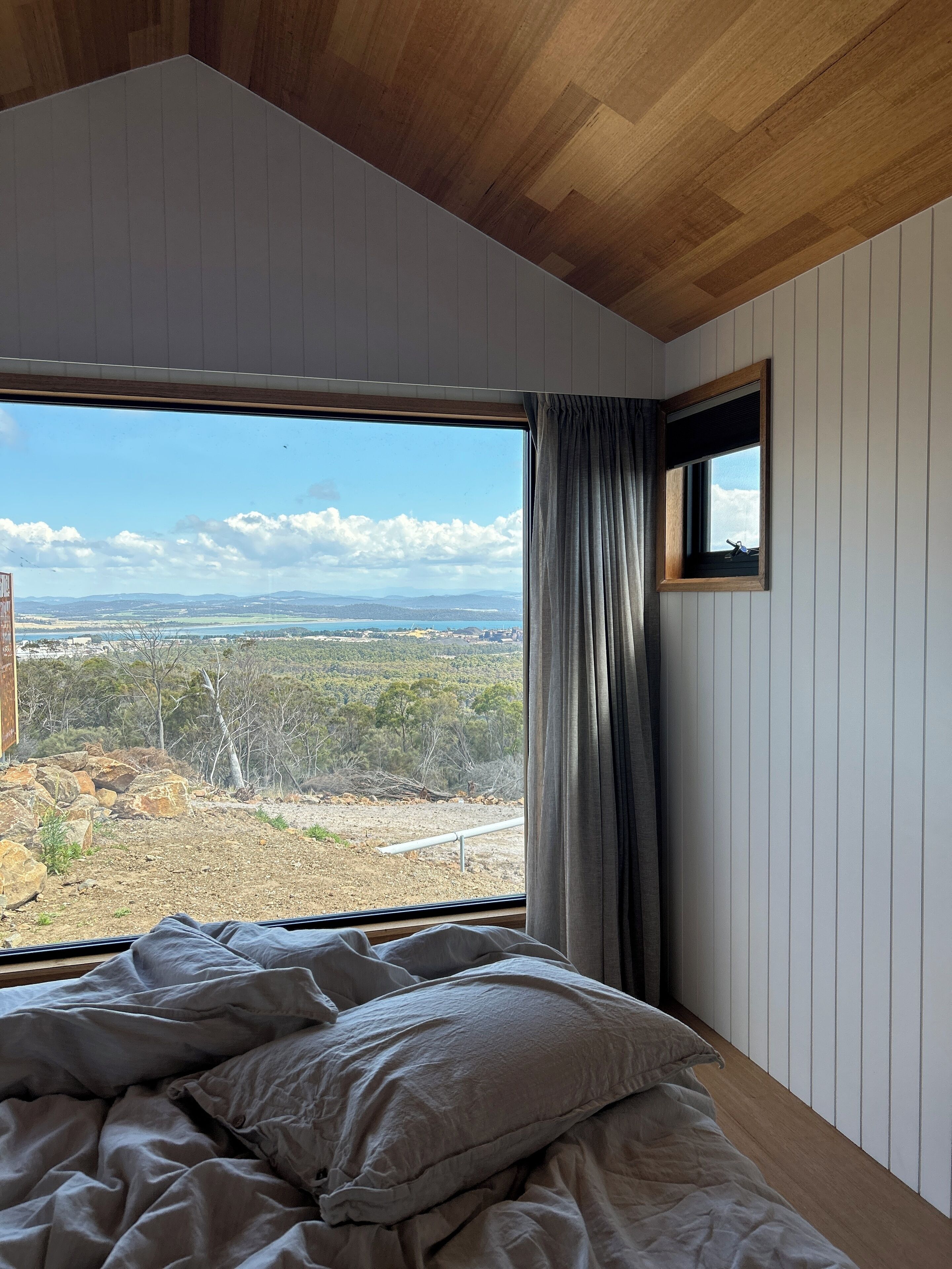 Deluxe Studio, 1 King Bed, River View | Blackout drapes, iron/ironing board, travel crib, free WiFi