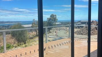 Deluxe Studio, 1 King Bed, River View | Terrace/patio