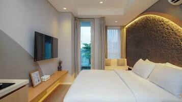 Superior Studio Suite, Balcony, City View | Desk, laptop workspace, iron/ironing board, free WiFi