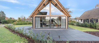 Modern bungalow in Baarle-Nassau with pond view
