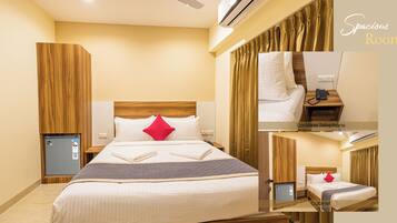 Quarto triplo conforto, para não fumantes, vista para a cidade (without Breakfast) | Escrivaninha, espaço de trabalho para notebook, cortinas blackout