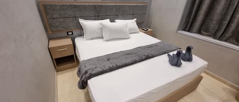 Egyptian cotton sheets, premium bedding, down duvets, pillow-top beds