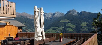 Farmhouse in secluded location above Merano with wellness area, garden, summit view