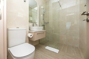 Shower, free toiletries, hair dryer, slippers