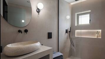 Shower, free toiletries, hair dryer, slippers