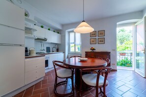 Apartment, 2 Bedrooms, Balcony, Lake View | Living area | 30-inch TV with satellite channels