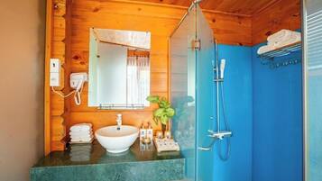 Hair dryer, slippers, towels, soap