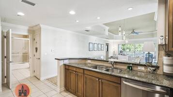 Exclusive Condo, Garden View | In-room safe, iron/ironing board, free WiFi