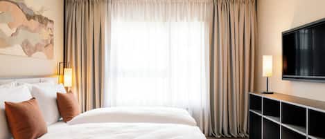 Smart Family Room | Roupas de cama premium, cofres nos quartos, Wi-Fi de cortesia