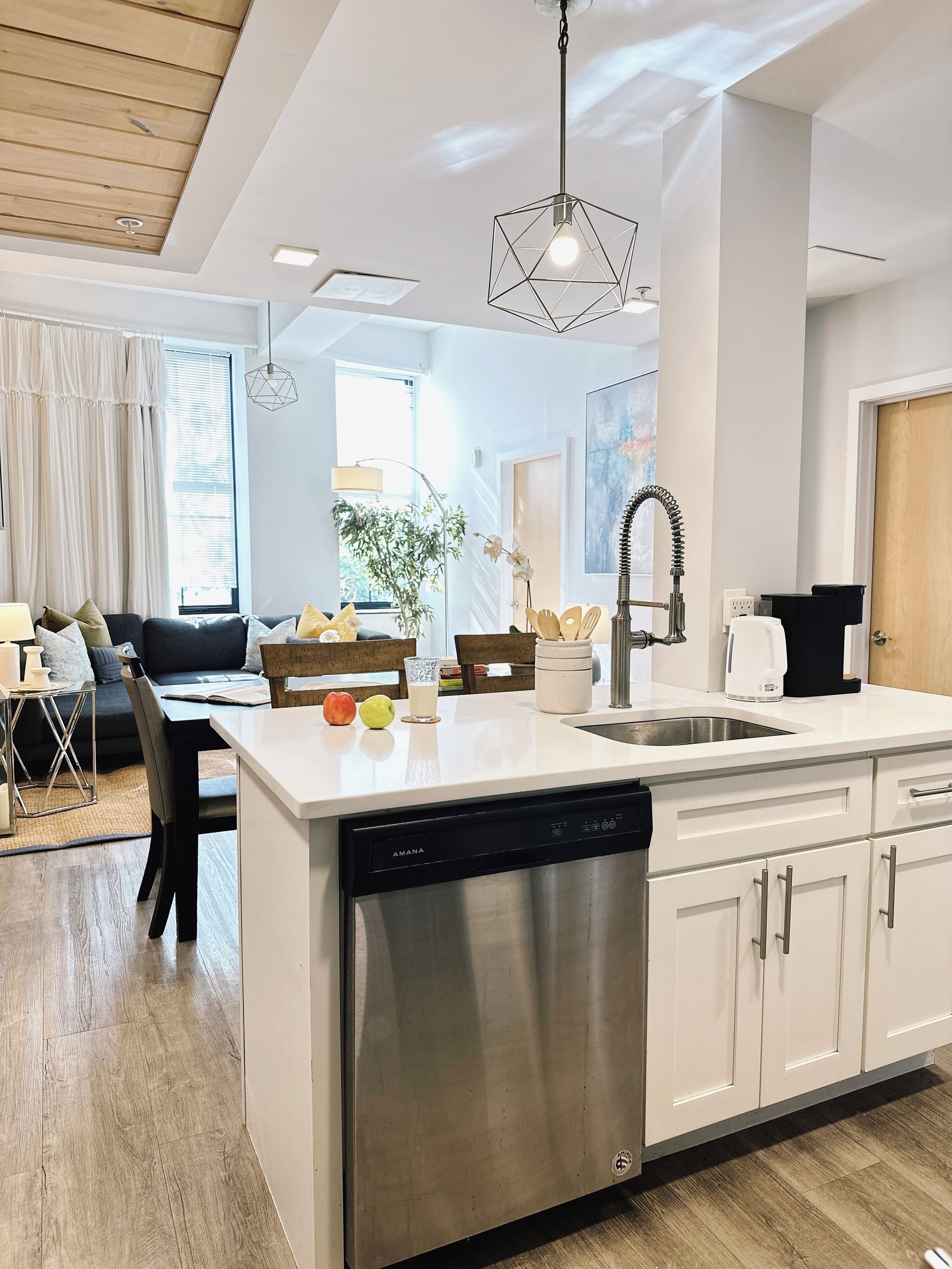 Bright, open kitchen blending seamlessly with the living space.