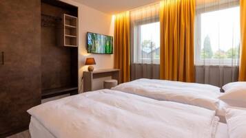 2 slaapkamers, een kluis op de kamer, een strijkplank/strijkijzer