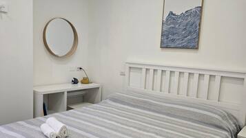 2 habitaciones, tabla de planchar con plancha, wifi y ropa de cama