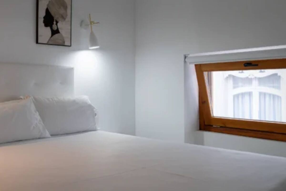 Premium bedding, Select Comfort beds, desk, laptop workspace