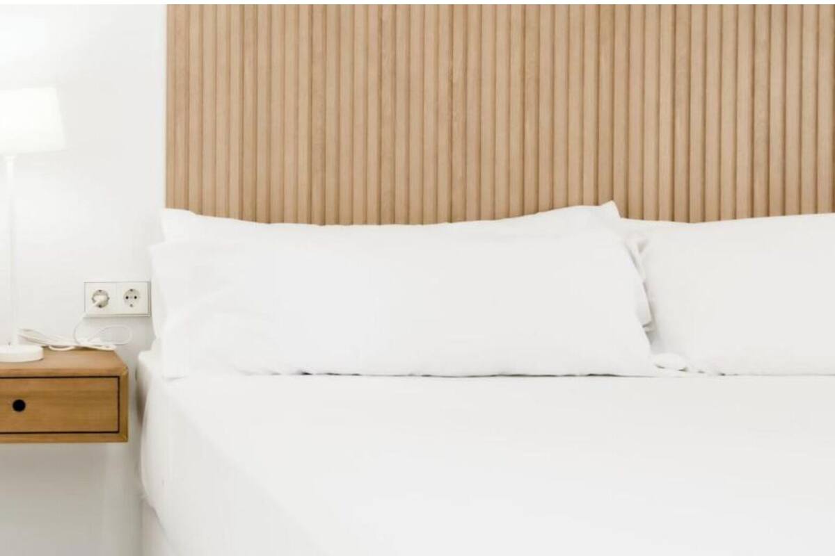 Premium bedding, Select Comfort beds, desk, laptop workspace