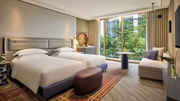 Premium bedding, pillow-top beds, minibar, in-room safe