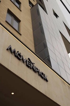 A building with the sign 'MOVENFICK' indicating a commercial property. - Mövenpick Yerevan (Yerevan)