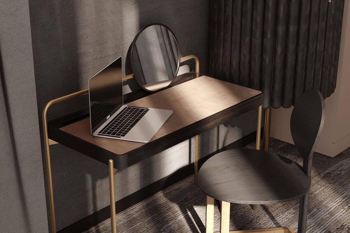 A modern desk with a laptop, a chair, and a curtain in a room.