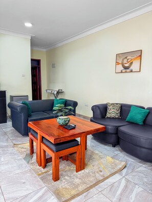 Apartament Deluxe, balcó, vistes a la ciutat | Sala d'estar