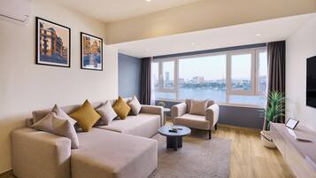 Studio Luxe, cuisine, vue fleuve | Coin séjour