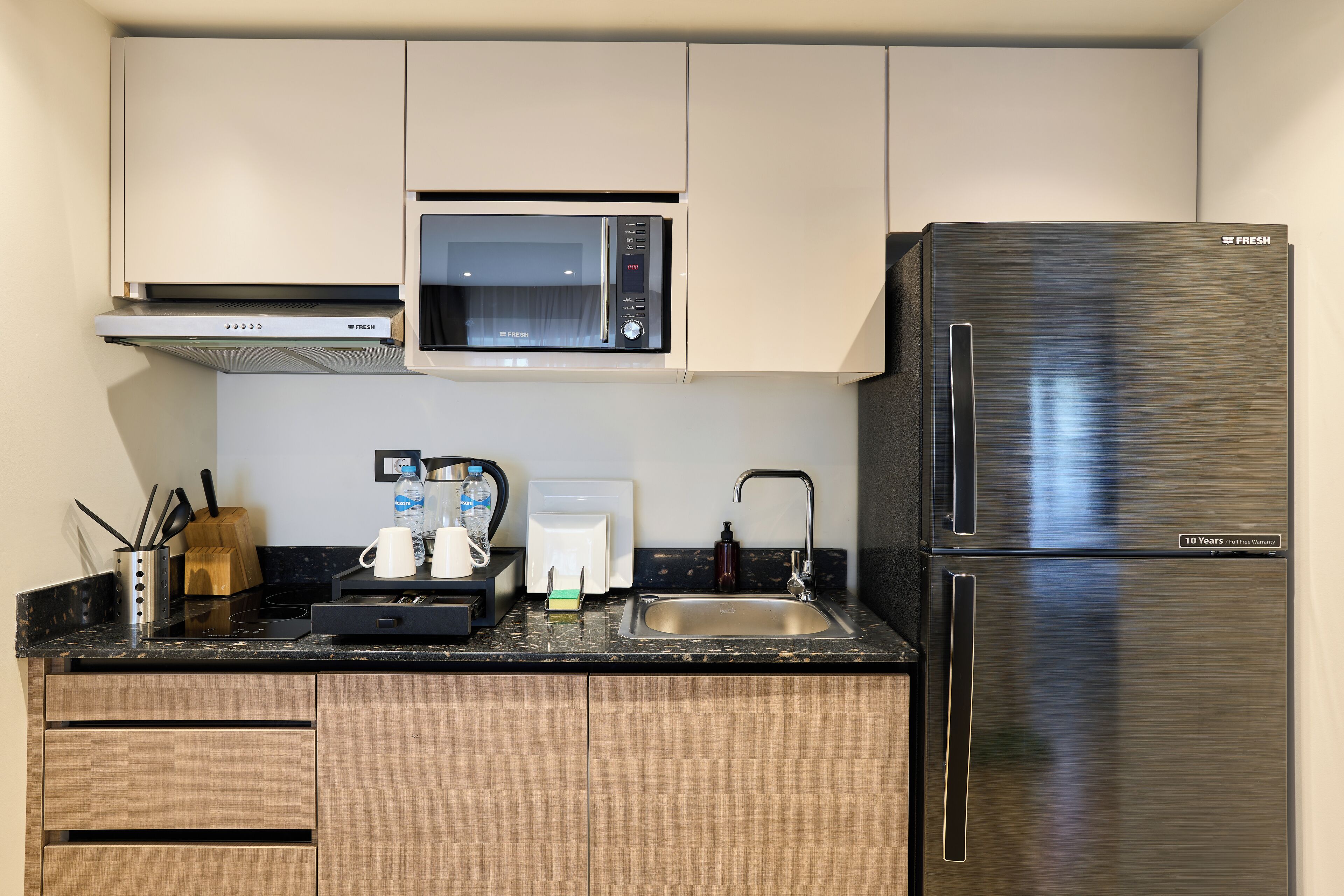 Mini-fridge, microwave, coffee/tea maker, electric kettle