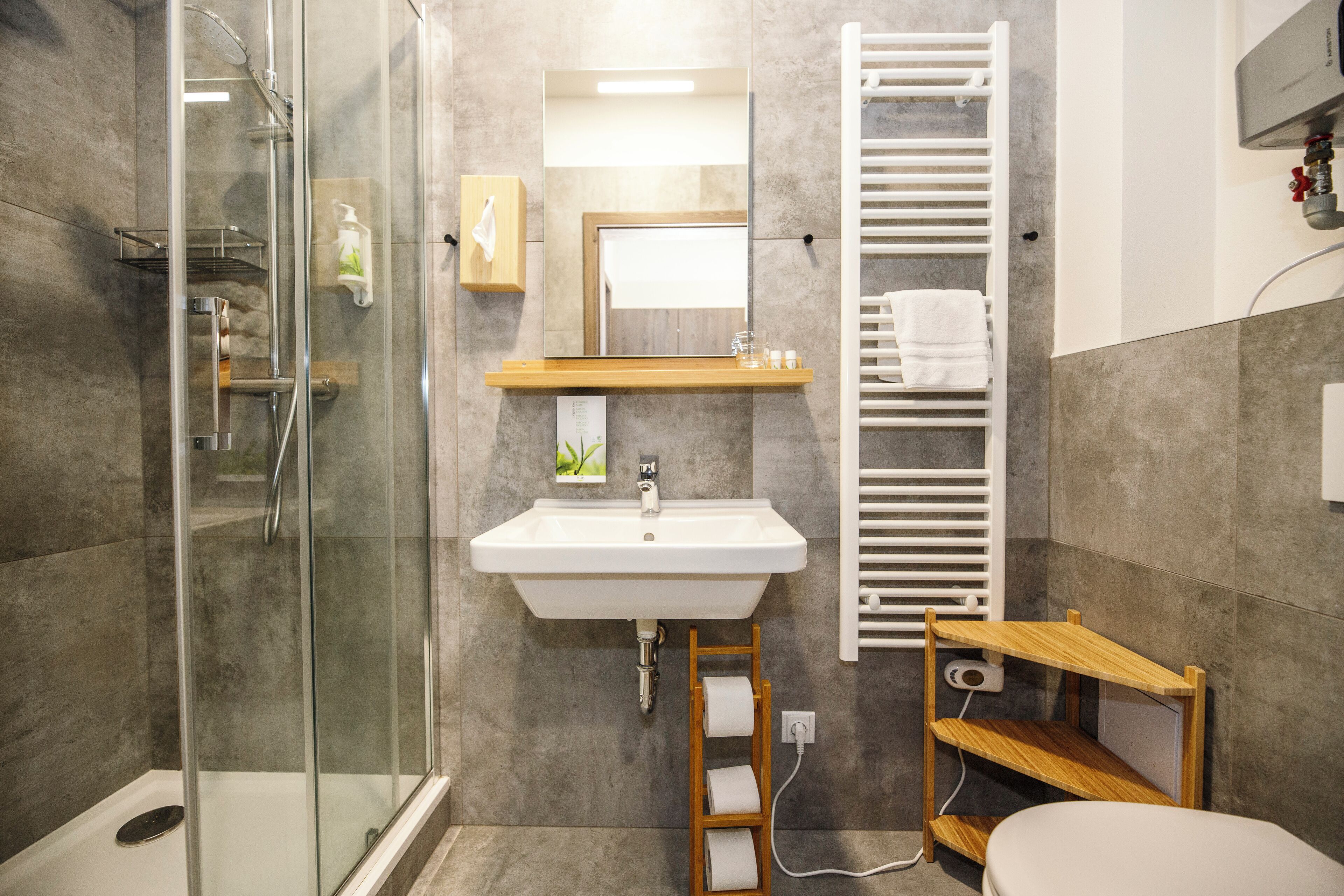 Shower, towels, soap, toilet paper