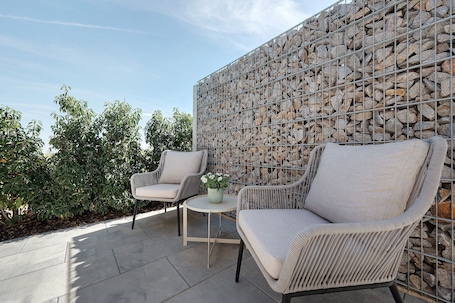 Terrace/patio. Apartment 'Chalet Seewald -' with Private Terrace, Shared Garden and Wi-Fi