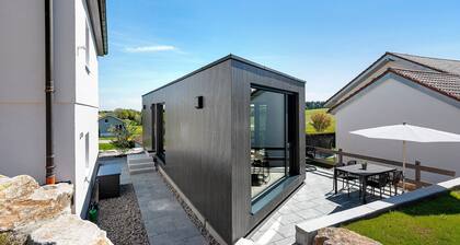Tiny Home 'Seewald - Tiny House' mit privater Terrasse, Gemeinschaftsgarten und WLAN
