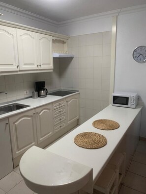 Fridge, microwave, coffee/tea maker, electric kettle