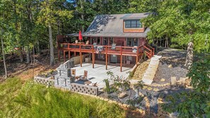 A cabin with a deck, outdoor seating, and a stone fireplace. - Heavenly Mountain VIew, Hot Tub, Fire Pit (Blue Ridge)