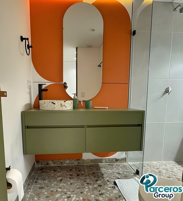 Shower, hair dryer, towels, soap